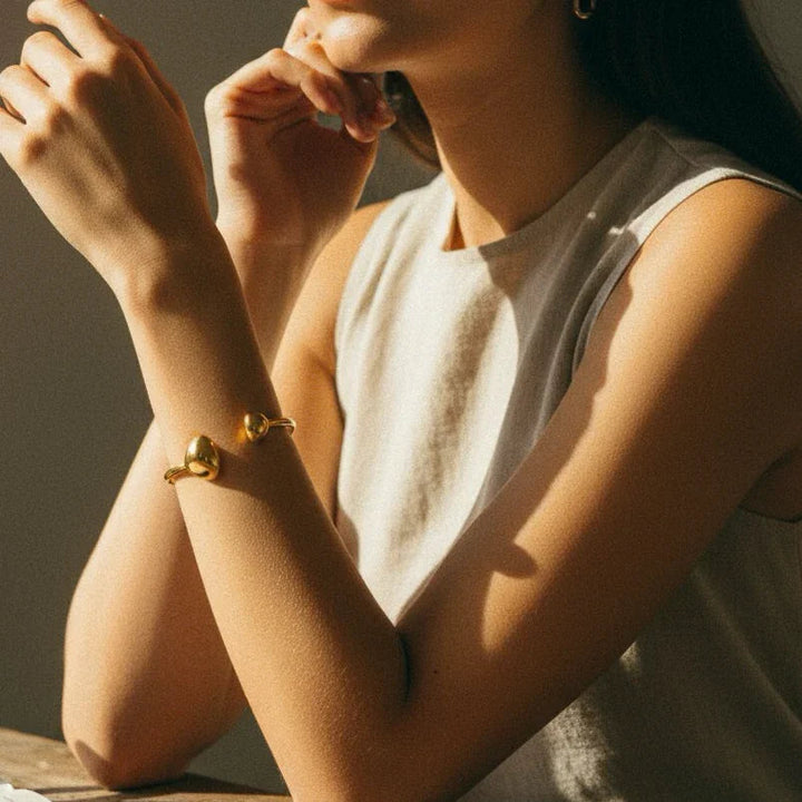 Mallory Minimalistische Goldmanschette