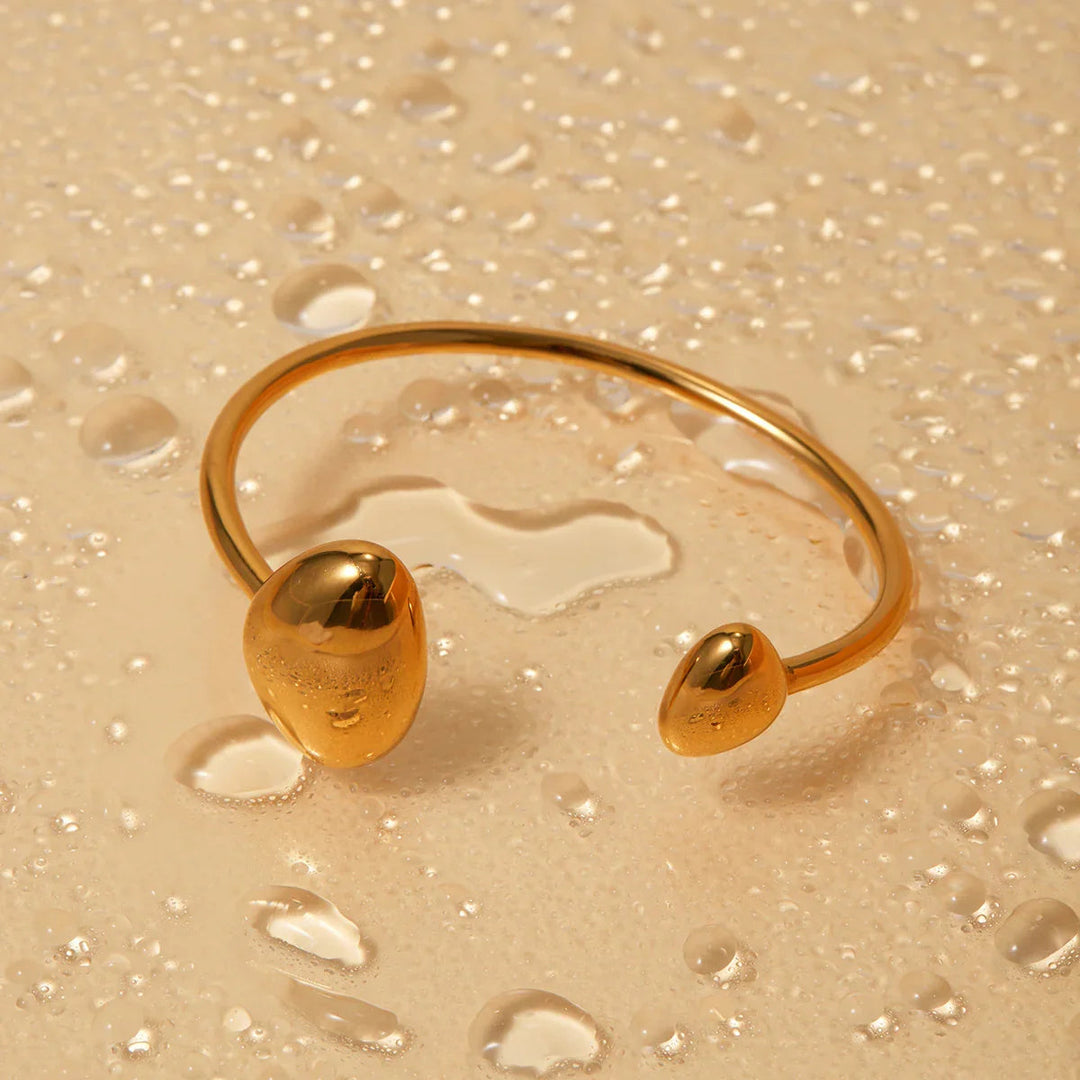 Mallory Minimalistische Goldmanschette