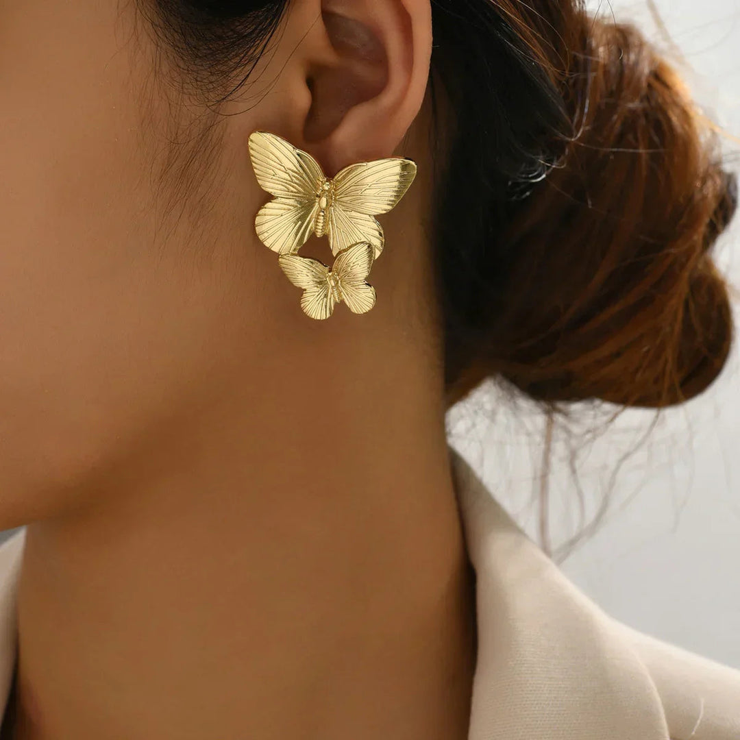 Boucles d'oreilles papillon en or