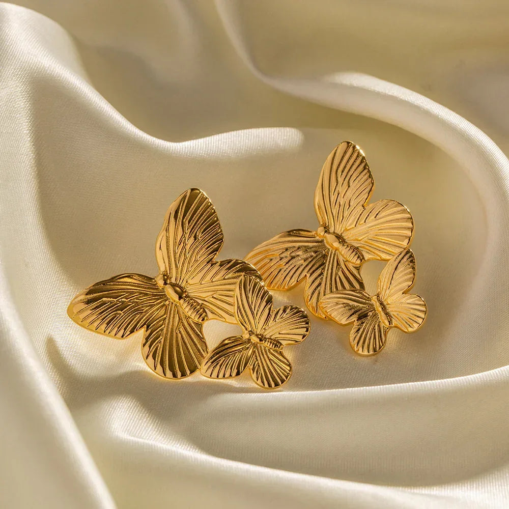 Boucles d'oreilles papillon en or