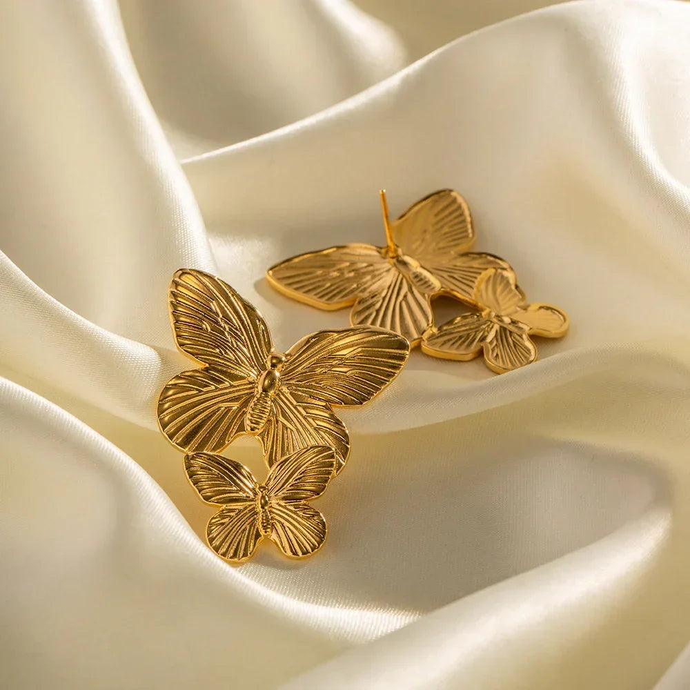 Boucles d'oreilles papillon en or