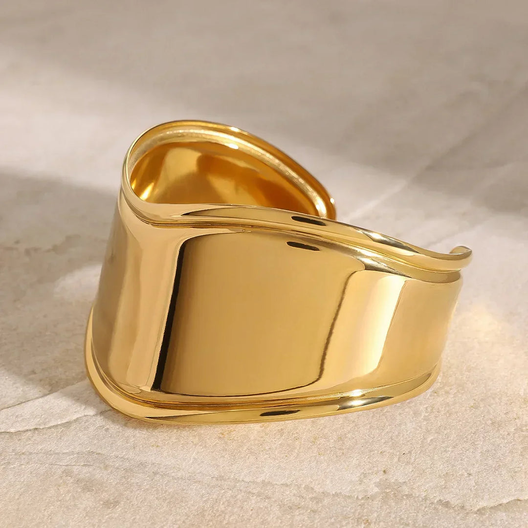 Izza Glatte Goldmanschette